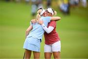 7 August 2021; Madelene Sagstrom of Sweden and Nanna Koerstz Madsen of Denmark, right, embrace on the 18th green during round four of the women's individual stroke play at the Kasumigaseki Country Club during the 2020 Tokyo Summer Olympic Games in Kawagoe, Saitama, Japan. Photo by Stephen McCarthy/Sportsfile