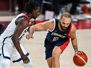 7 August 2021; Evan Fournier of France in action against Jrue Holiday of USA during the men's gold medal match between the USA and France at the Saitama Super Arena during the 2020 Tokyo Summer Olympic Games in Tokyo, Japan. Photo by Brendan Moran/Sportsfile