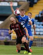 7 August 2021; Georgie Kelly of Bohemians in action against Cameron Evans of Waterford during the SSE Airtricity League Premier Division match between Waterford and Bohemians at RSC in Waterford. Photo by Matt Browne/Sportsfile