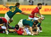 7 August 2021; Ali Price of British and Irish Lions escapes the tackle of Kwagga Smith of South Africa during the third test of the British and Irish Lions tour match between South Africa and British and Irish Lions at Cape Town Stadium in Cape Town, South Africa. Photo by Ashley Vlotman/Sportsfile
