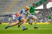 7 August 2021; Peter Hogan of Waterford in action against Declan Hannon of Limerick during the GAA Hurling All-Ireland Senior Championship semi-final match between Limerick and Waterford at Croke Park in Dublin. Photo by Seb Daly/Sportsfile