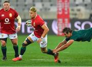 7 August 2021; Duhan van der Merwe of British and Irish Lions escapes the tackle of Eben Etzebeth of South Africa during the third test of the British and Irish Lions tour match between South Africa and British and Irish Lions at Cape Town Stadium in Cape Town, South Africa. Photo by Ashley Vlotman/Sportsfile