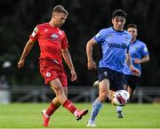 6 August 2021; John Ross Wilson of Shelbourne in action against Liam Kerrigan of UCD during the SSE Airtricity League First Division match between UCD and Shelbourne at the UCD Bowl in Dublin. Photo by Matt Browne/Sportsfile