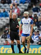 7 August 2021; Referee John Keenan shows a yellow card to Shane McNulty of Waterford during the GAA Hurling All-Ireland Senior Championship semi-final match between Limerick and Waterford at Croke Park in Dublin. Photo by Seb Daly/Sportsfile