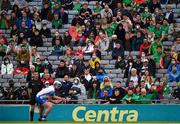 7 August 2021; Linesman James Owens and Limerick supporters, in the Hogan Stand, watch as Stephen Bennett of Waterford strikes a free during the GAA Hurling All-Ireland Senior Championship semi-final match between Limerick and Waterford at Croke Park in Dublin. Photo by Ray McManus/Sportsfile