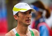 8 August 2021; Kevin Seaward of Ireland after crossing the finish line in 58th place during the men's marathon at Sapporo Odori Park on day 16 during the 2020 Tokyo Summer Olympic Games in Sapporo, Japan. Photo by Ramsey Cardy/Sportsfile