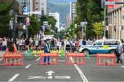 8 August 2021; A view of a police barricade on race route during the men's marathon at Sapporo Odori Park on day 16 during the 2020 Tokyo Summer Olympic Games in Sapporo, Japan. Photo by Ramsey Cardy/Sportsfile