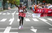 8 August 2021; Eliud Kipchoge of Kenya celebrates after winning the men's marathon at Sapporo Odori Park on day 16 during the 2020 Tokyo Summer Olympic Games in Sapporo, Japan. Photo by Ramsey Cardy/Sportsfile