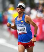 8 August 2021; Jeison Alexander Suarez of Colombia crosses the finish line during the men's marathon at Sapporo Odori Park on day 16 during the 2020 Tokyo Summer Olympic Games in Sapporo, Japan. Photo by Ramsey Cardy/Sportsfile