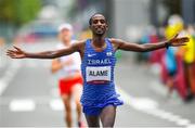 8 August 2021; Haimro Alame of Israel celebrates crossing the finish line during the men's marathon at Sapporo Odori Park on day 16 during the 2020 Tokyo Summer Olympic Games in Sapporo, Japan. Photo by Ramsey Cardy/Sportsfile