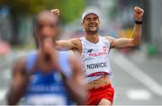8 August 2021; Adam Nowicki of Poland celebrates crossing the finish line during the men's marathon at Sapporo Odori Park on day 16 during the 2020 Tokyo Summer Olympic Games in Sapporo, Japan. Photo by Ramsey Cardy/Sportsfile
