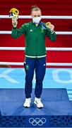 8 August 2021; Kellie Harrington of Ireland celebrates with her gold medal after defeating Beatriz Ferreira of Brazil in their women's lightweight final bout with at the Kokugikan Arena during the 2020 Tokyo Summer Olympic Games in Tokyo, Japan. Photo by Brendan Moran/Sportsfile