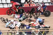 8 August 2021; Emily Kay of Ireland crashes during the women's omnium scratch race at Izu velodrome on day 16 during the 2020 Tokyo Summer Olympic Games in Shizuoka, Japan. Photo by Alex Broadway/Sportsfile