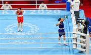 8 August 2021; Kellie Harrington of Ireland bows as Beatriz Ferreira of Brazil speaks to a TV camera after their women's lightweight final bout at the Kokugikan Arena during the 2020 Tokyo Summer Olympic Games in Tokyo, Japan. Photo by Brendan Moran/Sportsfile