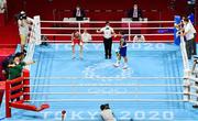 8 August 2021; Kellie Harrington of Ireland, left, reacts after being announced as the winner in her lightweight final bout with Beatriz Ferreira of Brazil at the Kokugikan Arena during the 2020 Tokyo Summer Olympic Games in Tokyo, Japan. Photo by Brendan Moran/Sportsfile