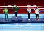 8 August 2021; Silver medalist Beatriz Ferreira of Brazil, left, gold medalist Kellie Harrington of Ireland, centre, and bronze medalists Mira Marjut Johanna Potkonen of Finland and Sudaporn Seesondee of Thailand with their medals after the women's lightweight bouts at the Kokugikan Arena during the 2020 Tokyo Summer Olympic Games in Tokyo, Japan. Photo by Brendan Moran/Sportsfile