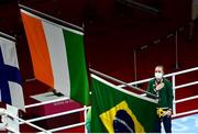 8 August 2021; Kellie Harrington of Ireland stands for the playing of the Irish national anthem after receiving her gold medal after defeating Beatriz Ferreira of Brazil in their women's lightweight final bout with at the Kokugikan Arena during the 2020 Tokyo Summer Olympic Games in Tokyo, Japan. Photo by Brendan Moran/Sportsfile