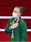 8 August 2021; Kellie Harrington of Ireland stands for the playing of the Irish national anthem after receiving her gold medal after defeating Beatriz Ferreira of Brazil in their women's lightweight final bout with at the Kokugikan Arena during the 2020 Tokyo Summer Olympic Games in Tokyo, Japan. Photo by Brendan Moran/Sportsfile