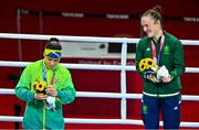 8 August 2021; Silver medalist Beatriz Ferreira of Brazil, left, and gold medalist Kellie Harrington of Ireland with their medals after their women's lightweight bout at the Kokugikan Arena during the 2020 Tokyo Summer Olympic Games in Tokyo, Japan. Photo by Brendan Moran/Sportsfile