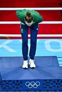 8 August 2021; Kellie Harrington of Ireland bows during the medal during the medal ceremony after defeating Beatriz Ferreira of Brazil in their women's lightweight final bout with at the Kokugikan Arena during the 2020 Tokyo Summer Olympic Games in Tokyo, Japan. Photo by Brendan Moran/Sportsfile
