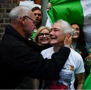 8 August 2021; Kellie Harrington's mother Yvonne is congratulated outside her Portland Row home, after watching Kellie's Tokyo 2020 Olympics lightweight final bout against Beatriz Ferreira of Brazil. Photo by Ray McManus/Sportsfile