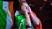 8 August 2021; A neighbour of Kellie Harrington's family, from Portland Row in Dublin, Aeo Gately watching her bout on a big screen when Kellie contested the Tokyo 2020 Olympics lightweight final bout against Beatriz Ferreira of Brazil. Photo by Ray McManus/Sportsfile
