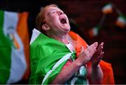 8 August 2021; A neighbour of Kellie Harrington's family, from Portland Row in Dublin, Aeo Gately watching her bout on a big screen when Kellie contested the Tokyo 2020 Olympics lightweight final bout against Beatriz Ferreira of Brazil. Photo by Ray McManus/Sportsfile