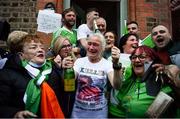 8 August 2021; Kellie Harrington's mother Yvonne, centre in white, is congratulated outside her Portland Row home, after watching Kellie's Tokyo 2020 Olympics lightweight final bout against Beatriz Ferreira of Brazil. Photo by Ray McManus/Sportsfile