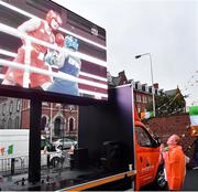 8 August 2021; A neighbour of Kellie Harrington's family, from Portland Row in Dublin, Aeo Gately watching her bout on a big screen when Kellie contested the Tokyo 2020 Olympics lightweight final bout against Beatriz Ferreira of Brazil. Photo by Ray McManus/Sportsfile