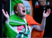 8 August 2021; A neighbour of Kellie Harrington's family, from Portland Row in Dublin, Aeo Gately watching her bout on a big screen when Kellie contested the Tokyo 2020 Olympics lightweight final bout against Beatriz Ferreira of Brazil. Photo by Ray McManus/Sportsfile