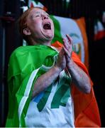 8 August 2021; A neighbour of Kellie Harrington's family, from Portland Row in Dublin, Aeo Gately watching her bout on a big screen when Kellie contested the Tokyo 2020 Olympics lightweight final bout against Beatriz Ferreira of Brazil. Photo by Ray McManus/Sportsfile