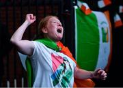 8 August 2021; A neighbour of Kellie Harrington's family, from Portland Row in Dublin, Aeo Gately watching her bout on a big screen when Kellie contested the Tokyo 2020 Olympics lightweight final bout against Beatriz Ferreira of Brazil. Photo by Ray McManus/Sportsfile