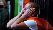 8 August 2021; A neighbour of Kellie Harrington's family, from Portland Row in Dublin, Aeo Gately celebrates after watching her bout on a big screen when Kellie contested the Tokyo 2020 Olympics lightweight final bout against Beatriz Ferreira of Brazil. Photo by Ray McManus/Sportsfile