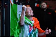 8 August 2021; A neighbour of Kellie Harrington's family, from Portland Row in Dublin, Aeo Gately watching her bout on a big screen when Kellie contested the Tokyo 2020 Olympics lightweight final bout against Beatriz Ferreira of Brazil. Photo by Ray McManus/Sportsfile