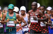 8 August 2021; Daniel Do Nascimento of Brazil, left, and Eliud Kipchoge of Kenya during the men's marathon at Sapporo Odori Park on day 16 during the 2020 Tokyo Summer Olympic Games in Sapporo, Japan. Photo by Ramsey Cardy/Sportsfile