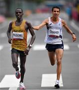 8 August 2021; Fred Musobo of Uganda, left, and Hassan Chahdi of France during the men's marathon at Sapporo Odori Park on day 16 during the 2020 Tokyo Summer Olympic Games in Sapporo, Japan. Photo by Ramsey Cardy/Sportsfile