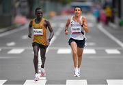 8 August 2021; Fred Musobo of Uganda, left, and Hassan Chahdi of France during the men's marathon at Sapporo Odori Park on day 16 during the 2020 Tokyo Summer Olympic Games in Sapporo, Japan. Photo by Ramsey Cardy/Sportsfile