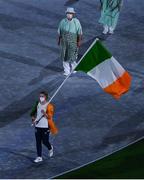 8 August 2021; Natalya Coyle of Ireland carries the Irish tricolour during the closing ceremony at the Olympic Stadium during the 2020 Tokyo Summer Olympic Games in Tokyo, Japan. Photo by Brendan Moran/Sportsfile