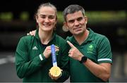 8 August 2021; Kellie Harrington of Ireland and Ireland boxing high performance director Bernard Dunne celebrate with her gold medal after victory over Beatriz Ferreira of Brazil in their women's lightweight final bout at the Kokugikan Arena during the 2020 Tokyo Summer Olympic Games in Tokyo, Japan. Photo by Brendan Moran/Sportsfile