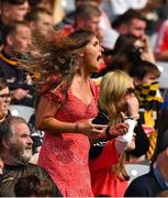 8 August 2021; A Cork supporter in the Cusack Stand cheers on her team during the GAA Hurling All-Ireland Senior Championship semi-final match between Kilkenny and Cork at Croke Park in Dublin. Photo by Ray McManus/Sportsfile