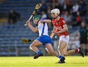 9 August 2021; Conor Keane of Waterford in action against Eoin O'Leary of Cork during the Electric Ireland Munster Minor Hurling Championship Final match between Cork and Waterford at Semple Stadium in Thurles, Tipperary. Photo by Piaras Ó Mídheach/Sportsfile