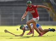 9 August 2021; Ben Nyhan of Cork in action against Craig O'Keeffe of Waterford during the Electric Ireland Munster Minor Hurling Championship Final match between Cork and Waterford at Semple Stadium in Thurles, Tipperary. Photo by Piaras Ó Mídheach/Sportsfile