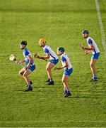 9 August 2021; Waterford players, from left, Cian Troy, Charlie Treen, Conor Keane, and Rory Dobbyn wait for a Cork free to be taken during the Electric Ireland Munster Minor Hurling Championship Final match between Cork and Waterford at Semple Stadium in Thurles, Tipperary. Photo by Piaras Ó Mídheach/Sportsfile