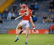 9 August 2021; Cork players Mikey Finn, behind, Ben O'Connor celebrate after their side's victory in the Electric Ireland Munster Minor Hurling Championship Final match between Cork and Waterford at Semple Stadium in Thurles, Tipperary. Photo by Piaras Ó Mídheach/Sportsfile