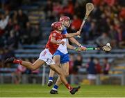 9 August 2021; Peter Cummins of Waterford in action against William Buckley of Cork during the Electric Ireland Munster Minor Hurling Championship Final match between Cork and Waterford at Semple Stadium in Thurles, Tipperary. Photo by Piaras Ó Mídheach/Sportsfile