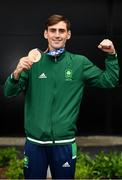 10 August 2021; Bronze medallist Aidan Walsh at Dublin Airport as Team Ireland's boxers return from the Tokyo 2020 Olympic Games. Photo by Seb Daly/Sportsfile