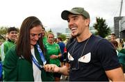 10 August 2021; Gold medallist Kellie Harrington with WBA Interim World Featherweight title holder Michael Conlan at Dublin Airport as Team Ireland's boxers return from the Tokyo 2020 Olympic Games. Photo by Seb Daly/Sportsfile