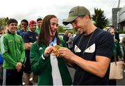 10 August 2021; Gold medallist Kellie Harrington with WBA Interim World Featherweight title holder Michael Conlan at Dublin Airport as Team Ireland's boxers return from the Tokyo 2020 Olympic Games. Photo by Seb Daly/Sportsfile