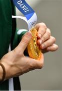 10 August 2021; Gold medallist Kellie Harringotn holds her medal as she is interviewed at Dublin Airport as Team Ireland's boxers return from the Tokyo 2020 Olympic Games. Photo by Seb Daly/Sportsfile