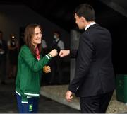 10 August 2021; Gold medallist Kellie Harrington is greeted by Minister of State for Sport, the Gaeltacht & Defence, Jack Chambers TD, at Dublin Airport as Team Ireland's boxers return from the Tokyo 2020 Olympic Games. Photo by Seb Daly/Sportsfile